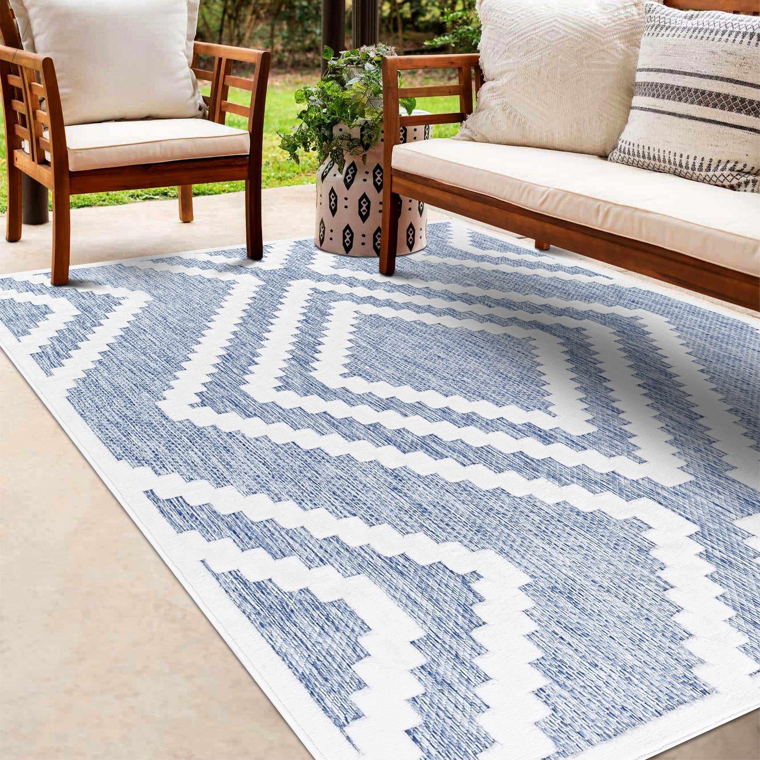 Amala 6'7in x 9' Outdoor Area Rug - Hauteloom