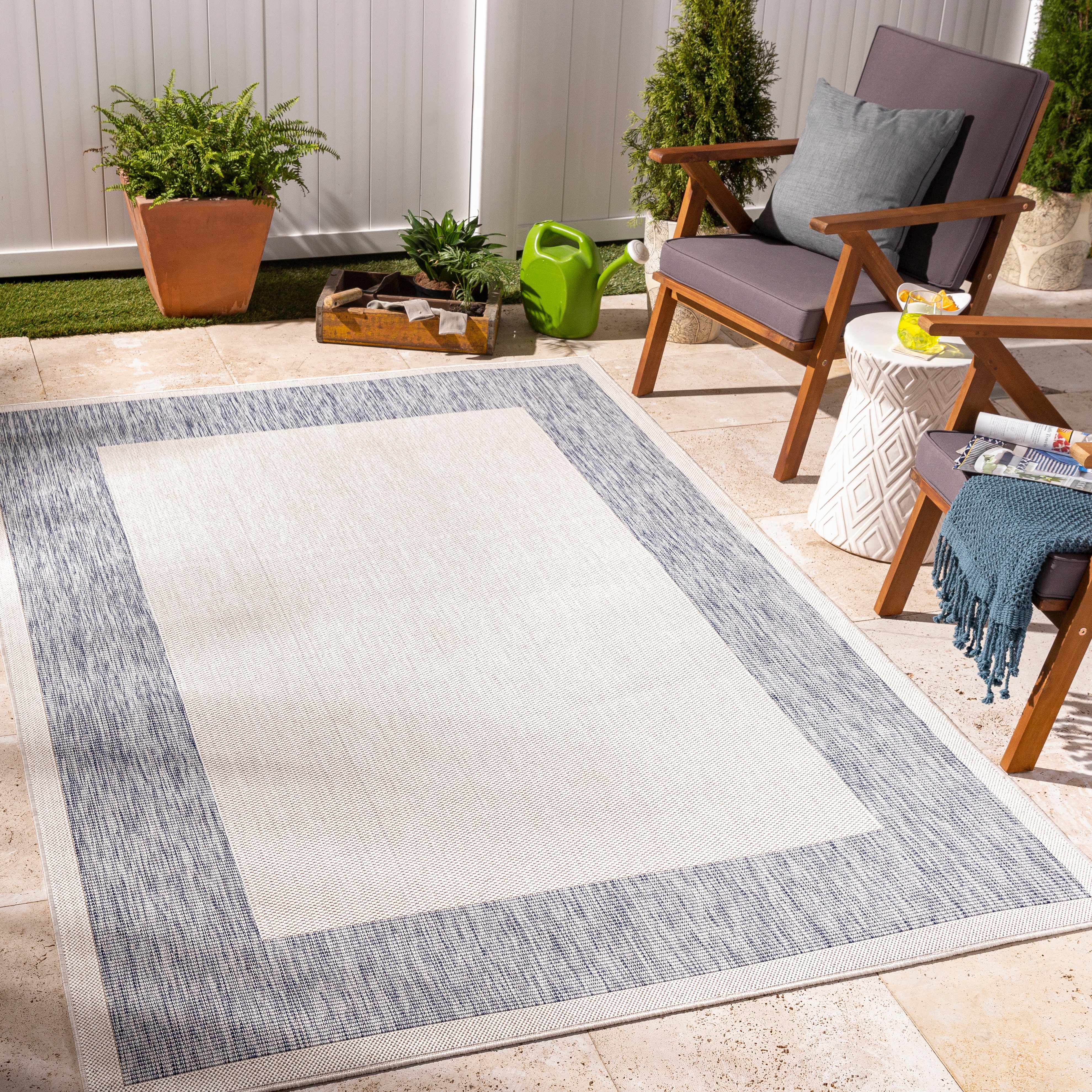 Kiah 6'7in x 9' Cottage Outdoor Solid Outdoor Area Rug - Hauteloom