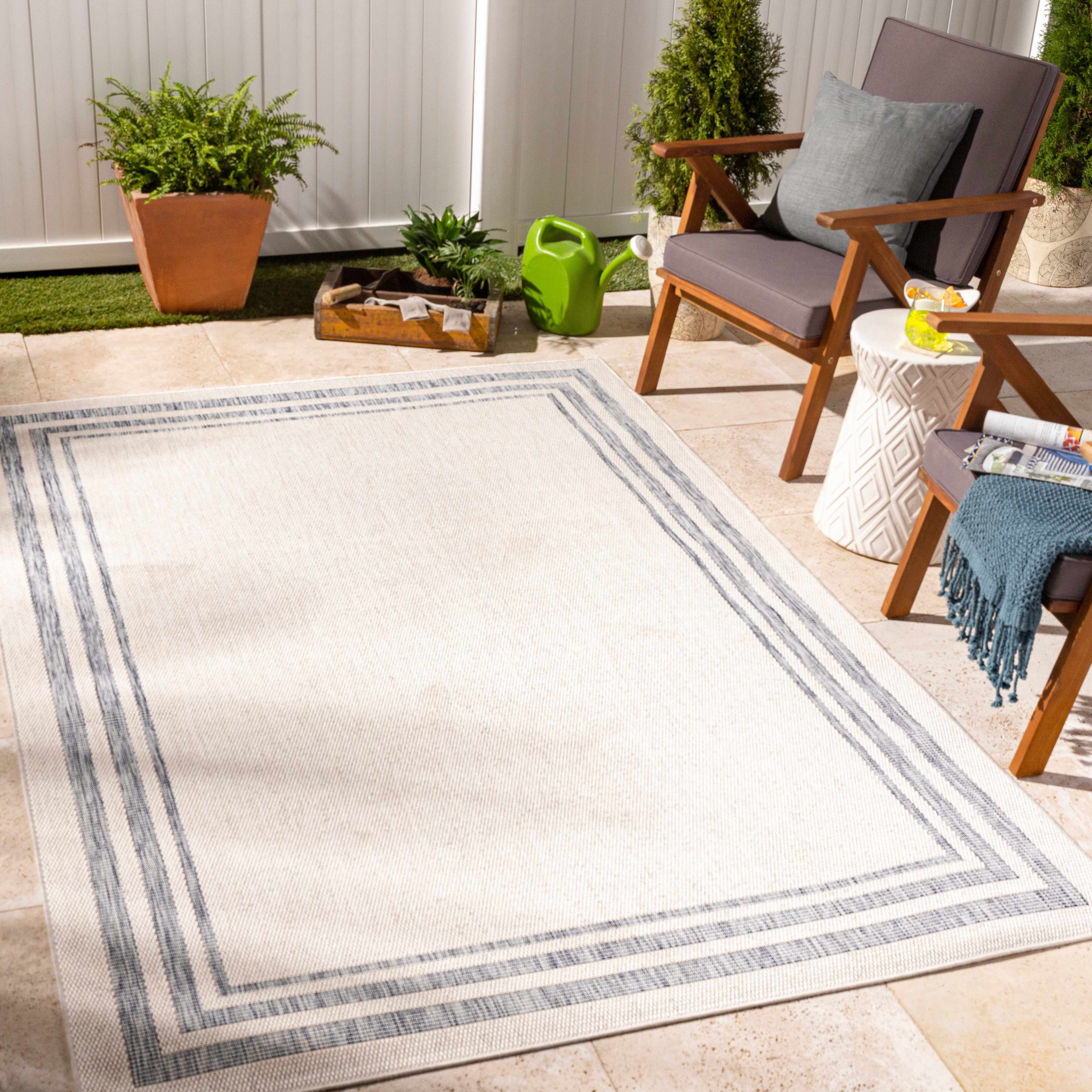 Utku 6'7in x 9' Cottage Outdoor Solid Outdoor Area Rug - Hauteloom